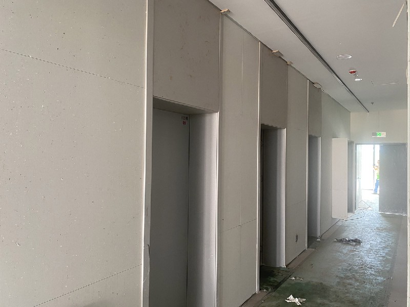 无机纹理洞石工程案例-电梯间